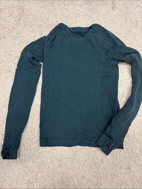 Athleta warm running top. Dark green.